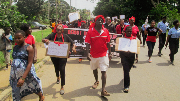 The demonstrators marching to the office of the Agona West Municipal Assembly The demonstrators marching to the office of the Agona West Municipal Assembly